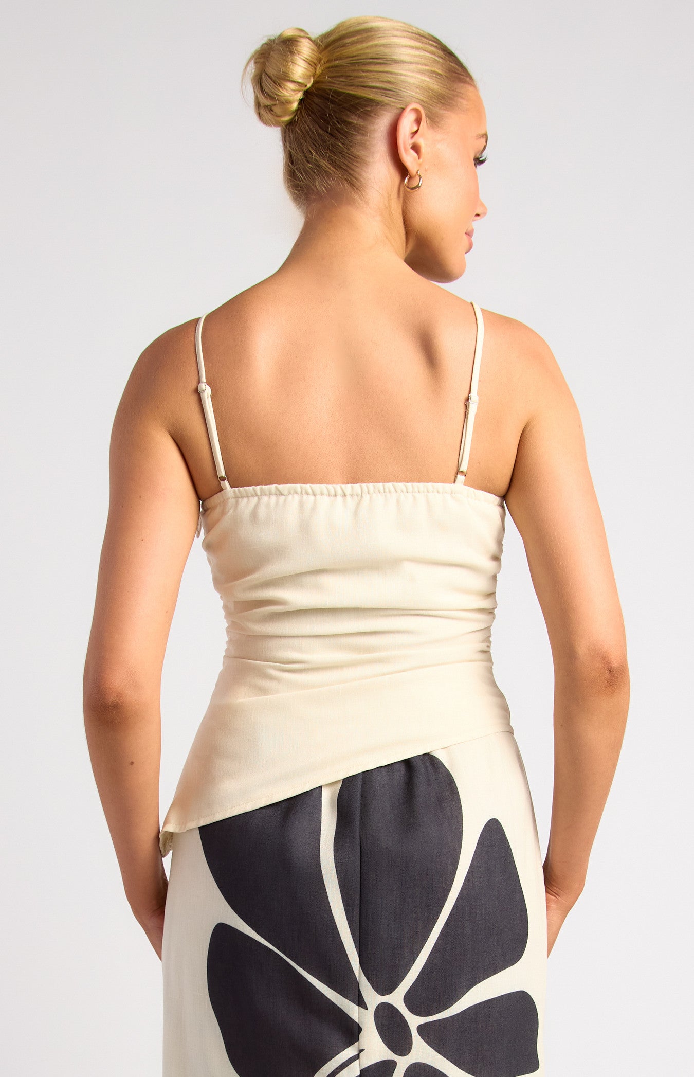 Style state multi beaded strap detail faux hem top