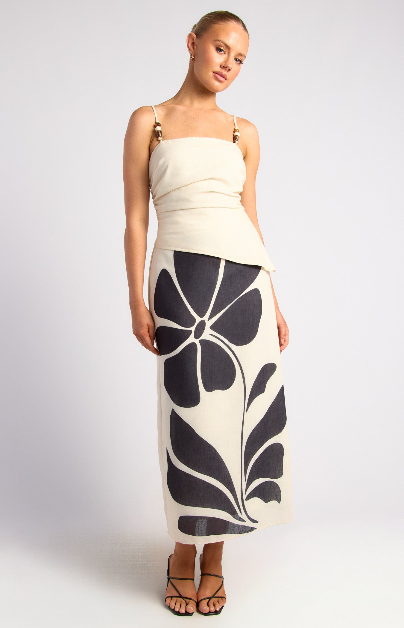 Style state multi beaded strap detail faux hem top